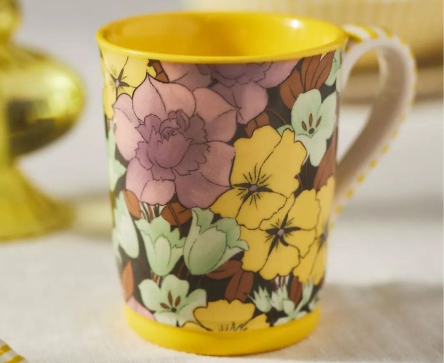 A yellow floral mug 