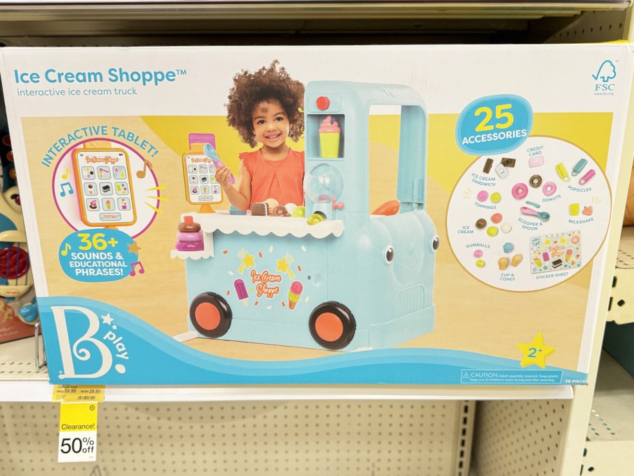 ice cream truck toy on shelf with 50% off clearance tag