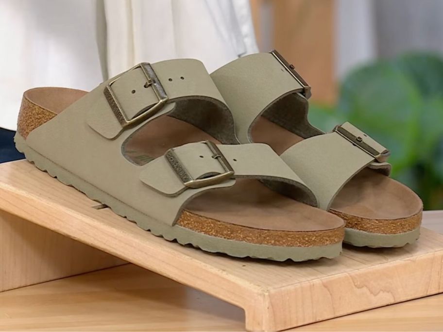A pair of Birkenstock sandals in Khaki color