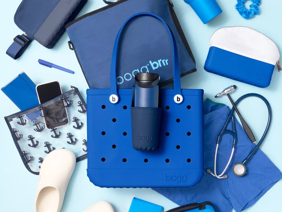 blue bogg bag surrounded by accessories