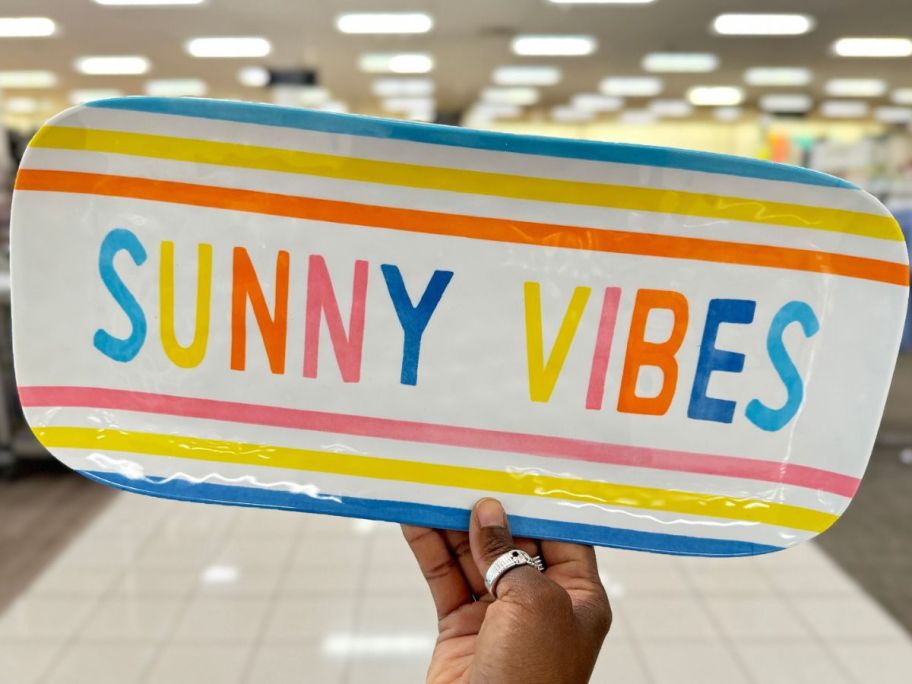Hand holding up a Celebrate Together Summer tray with Sunny Vibes on it