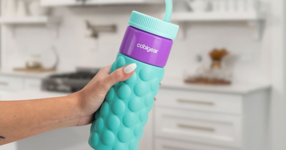 ColdGear Water Bottle being held in a kitchen
