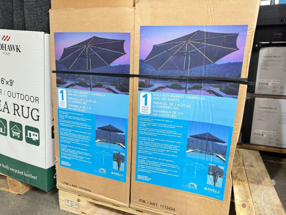 Costco 10' Round Umbrella in boxes