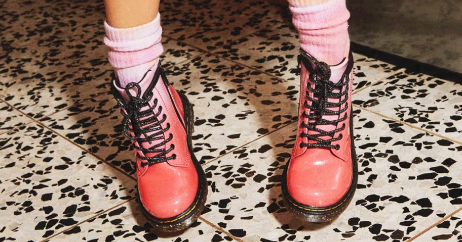 girl wearing pink leather boots