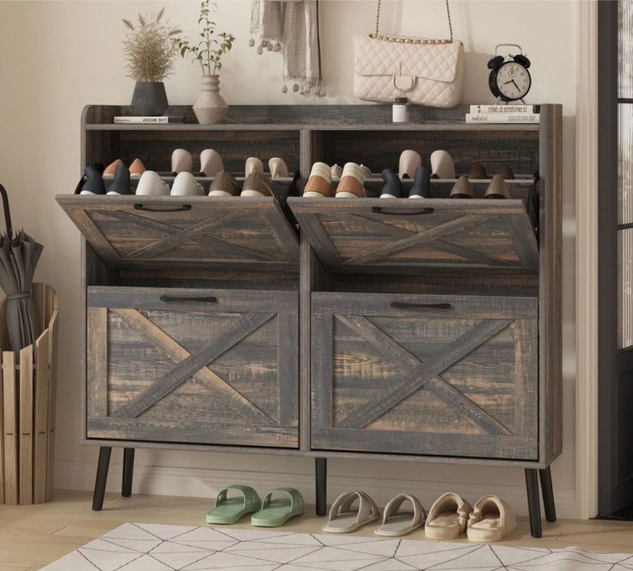 a gray wooden shoe cabinet
