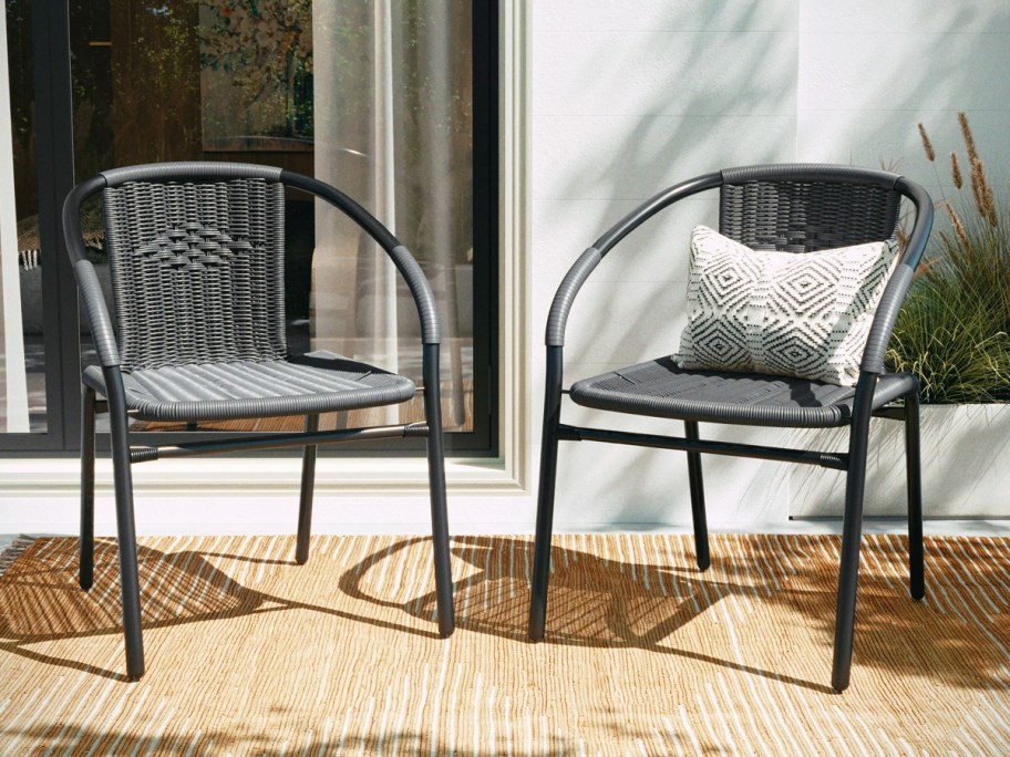 grey and black rattan patio chairs