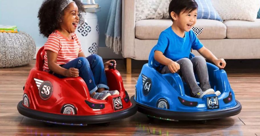 2 kids playing on bumper cars