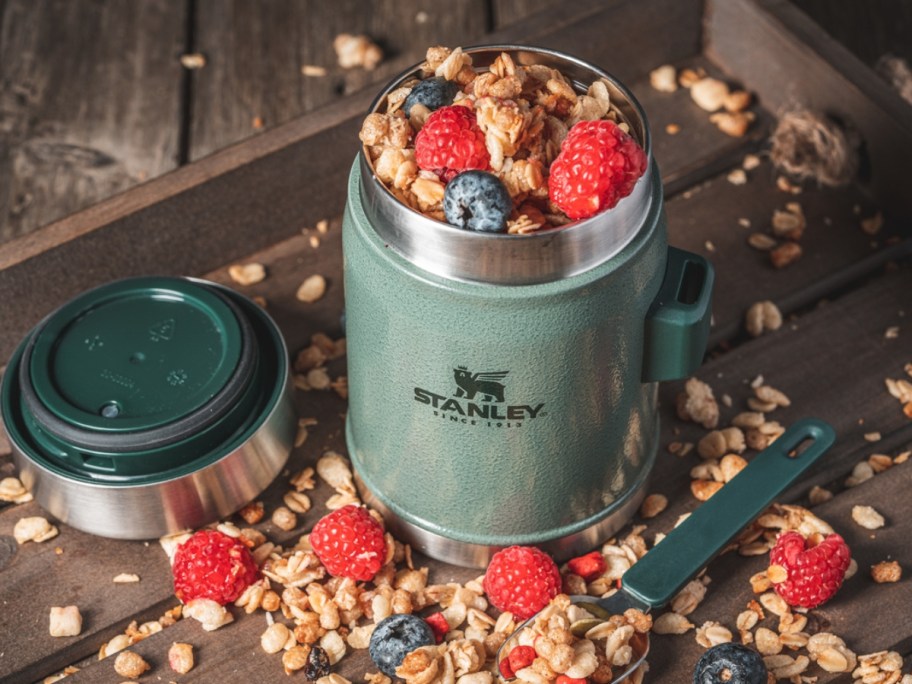 Stanley food jar open with granola and fruit spilling out