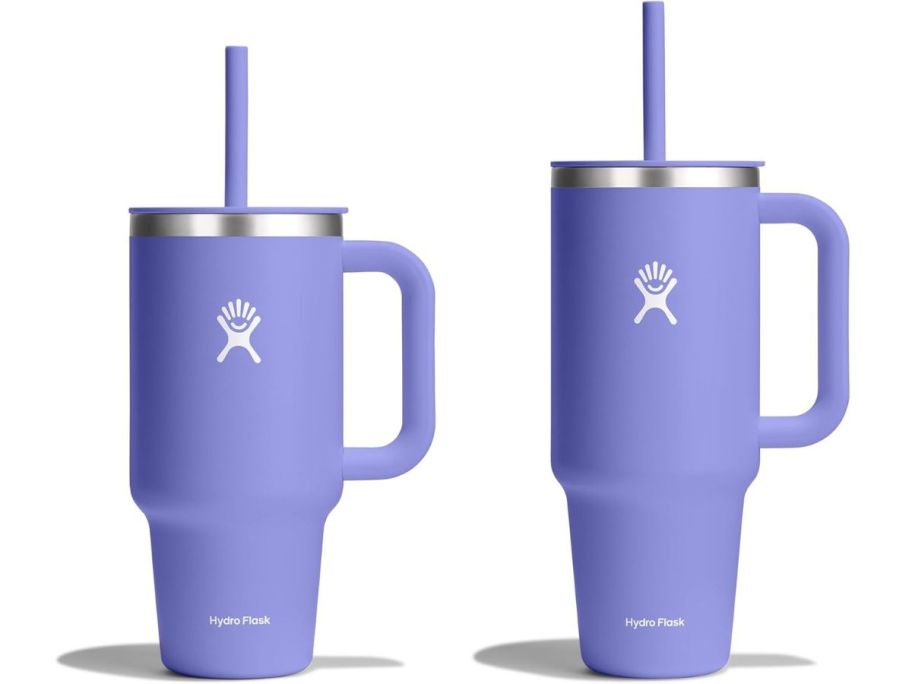 two purple hydro flask tumblers on white background