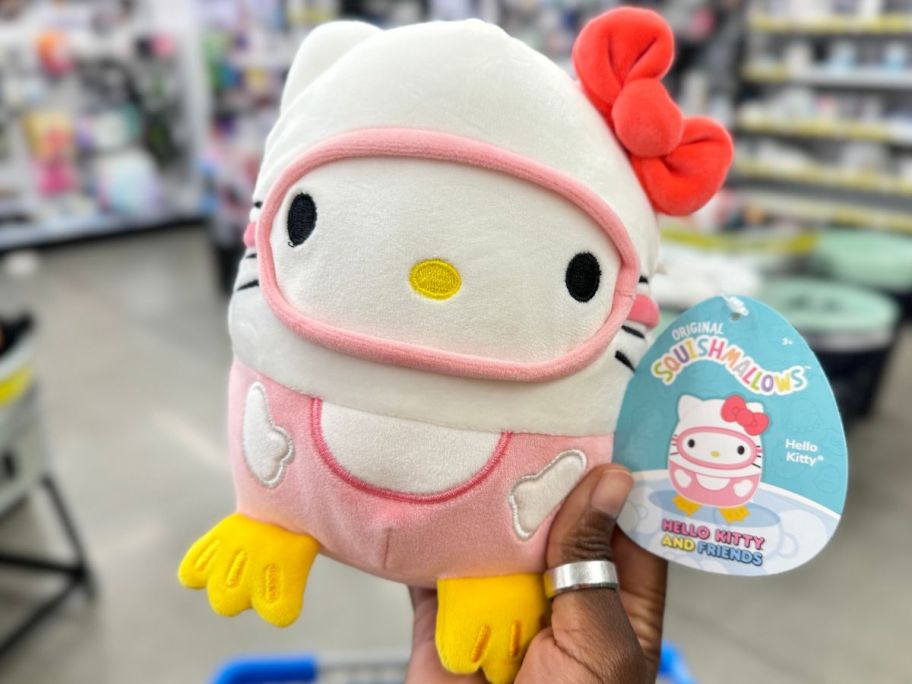 Hand holding up a Hello Kitty Squishmallow