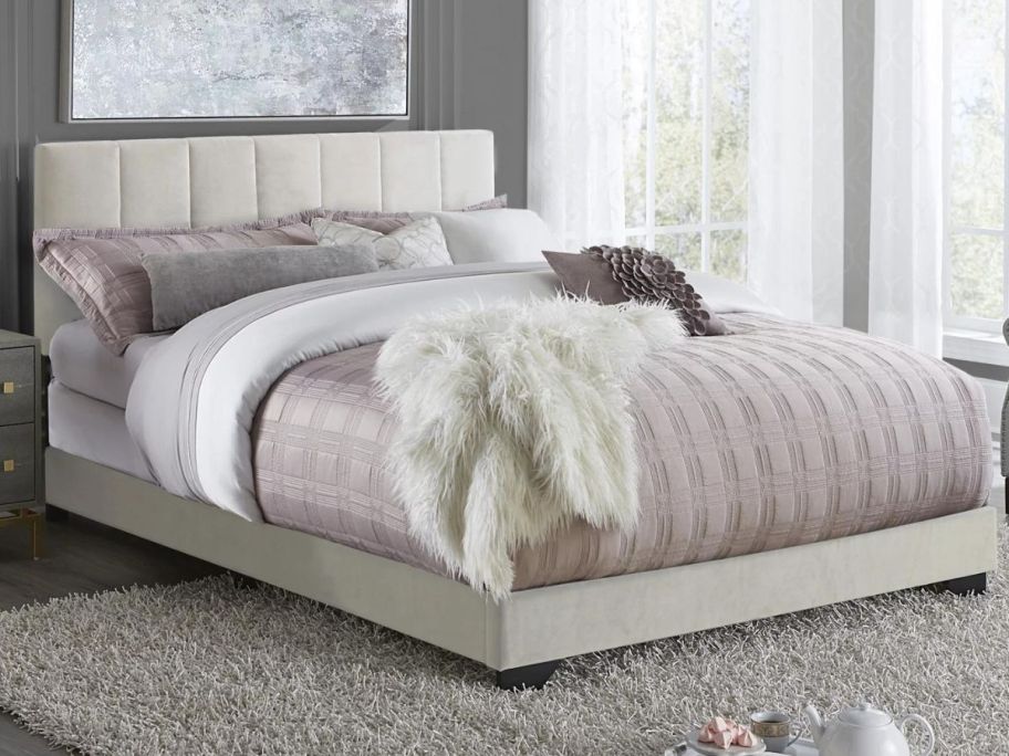 A Hillsdale Living Essentials Reece Channel Stitched Upholstered Queen Bed in Ivory