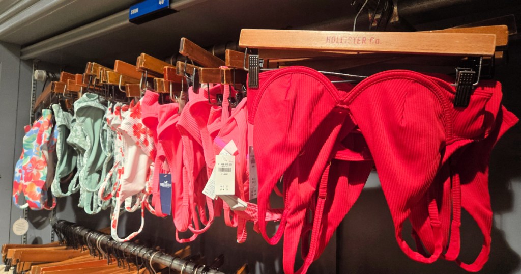bikini tops hanging in hollister store