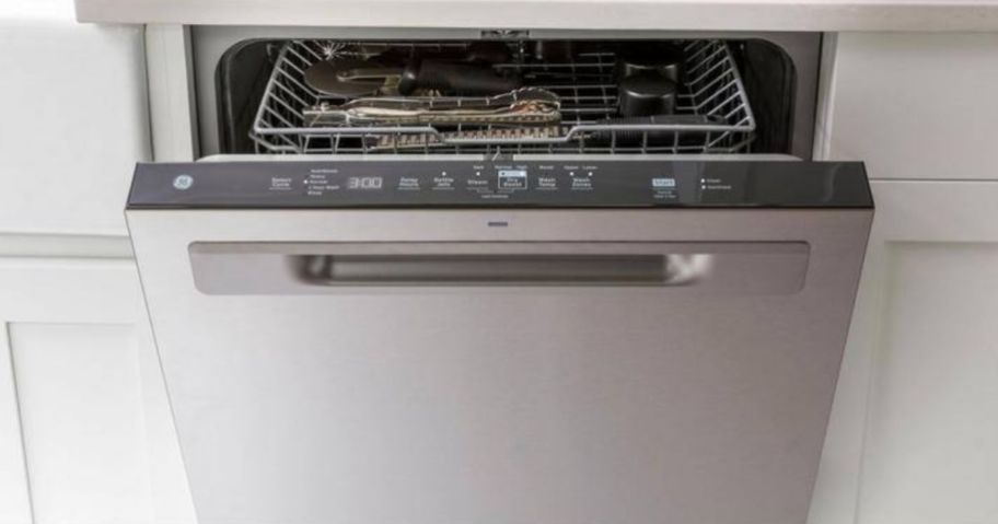 A partially open dishwasher 