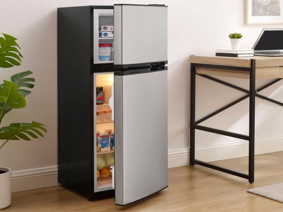 A mini fridge in a kichen