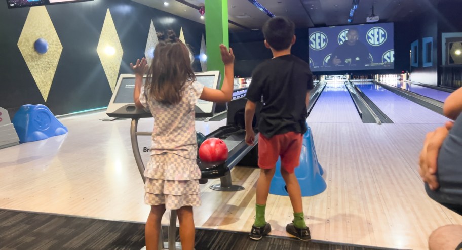 Kids bowling at dave and buster