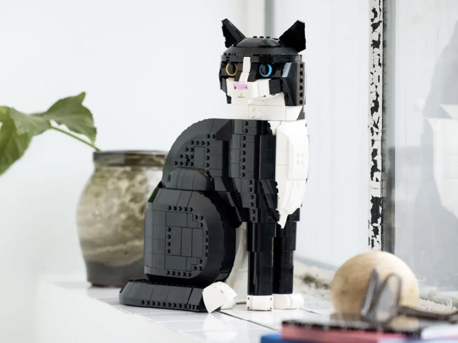 black and white lego cat on white table