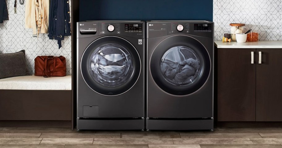 black front-load LG washer & dryer in laundry room