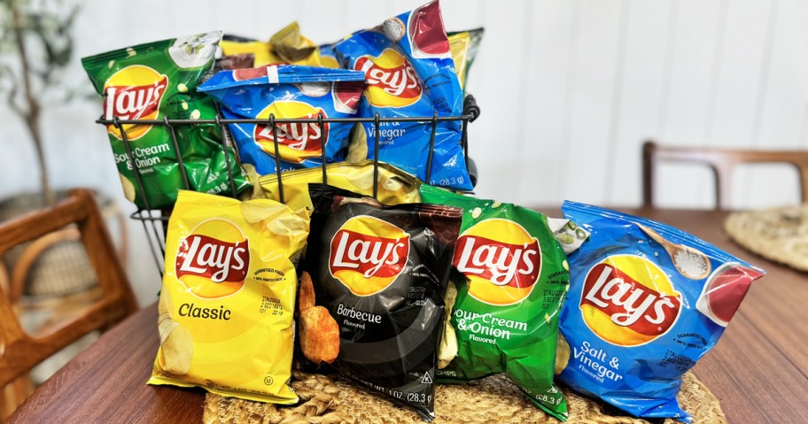 bags of lay's potato chips in various flavors on table