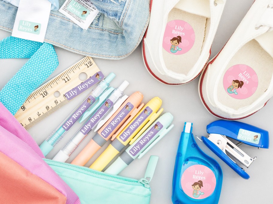 school supplies, clothing, and shoes with name labels
