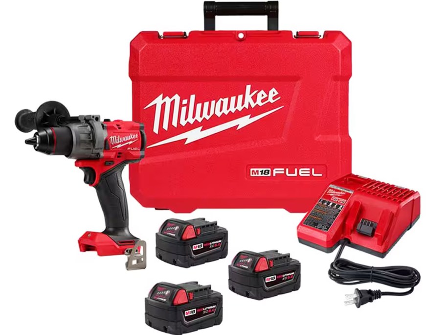 milwaukee drill, 3 batteries, charger, and hard case