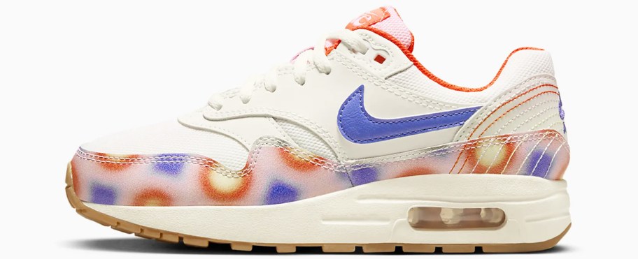off white kids Nike shoe with blue and orange circle designs