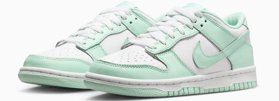 mint green and white nike sneakers