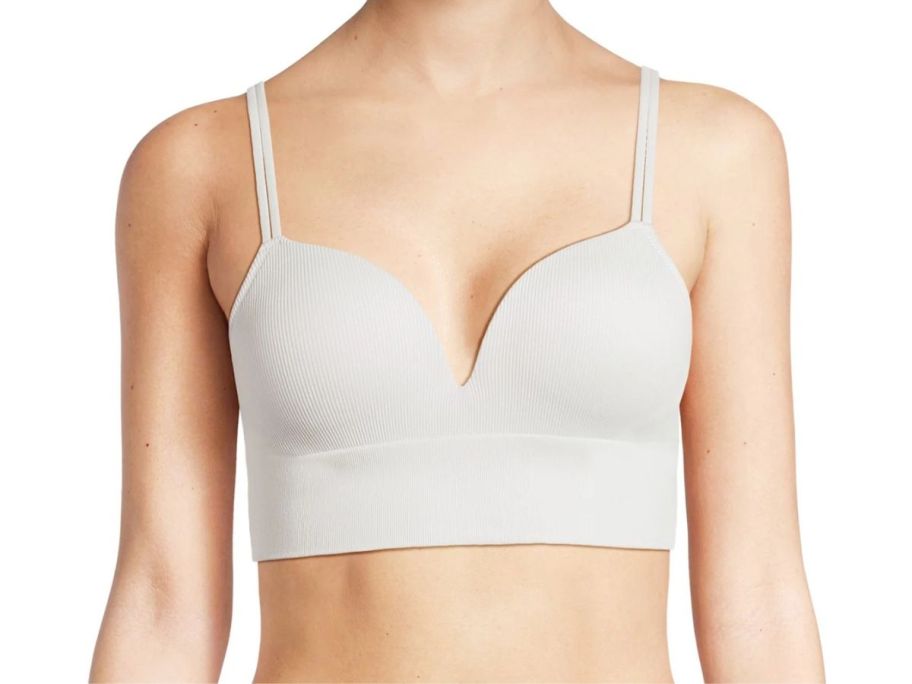 Woman wearing No Boundaries Women's Light Lift Wireless Seamless Ribbed Bra