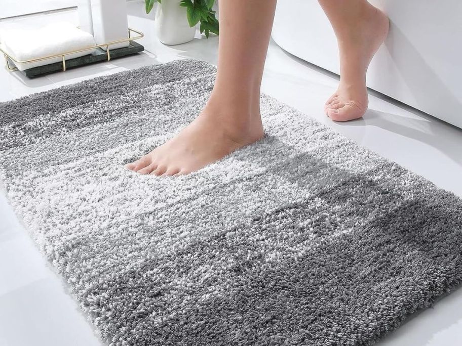 woman stepping onto Olanly 30x20" Luxury Bathroom Mat in Grey