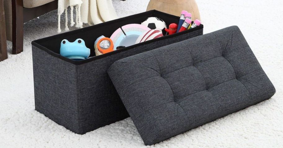 An ornavo Storage Ottoman filled with toys