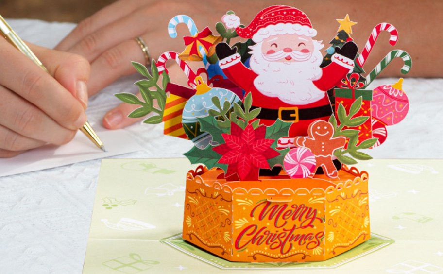 santa pop-up card that says merry christmas