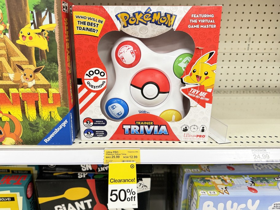 Pokemon Trainer Trivia Game on shelf with 50% off clearance tag