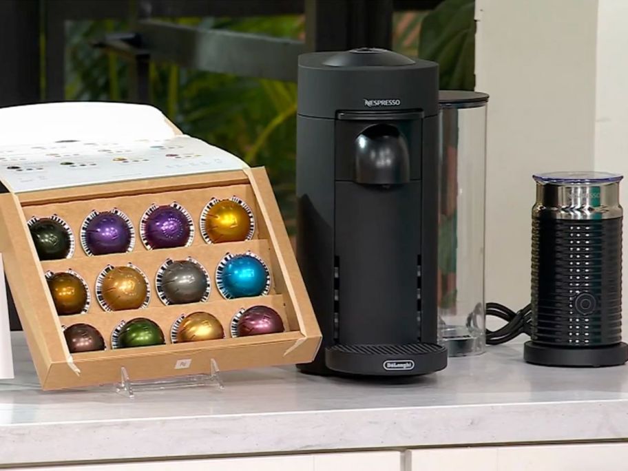 A Nespresso Bundle rrom QVC with Vertuo Coffee Maker, Aeroccino and pack of assorted coffee pods