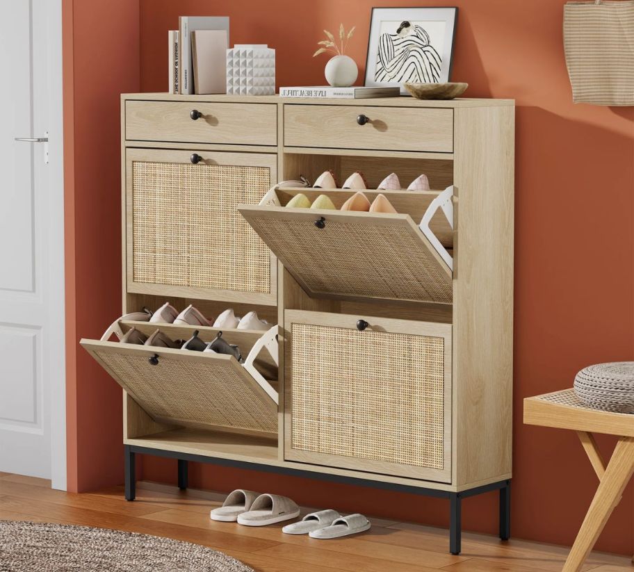 a natural colored rattan shoe cabinet