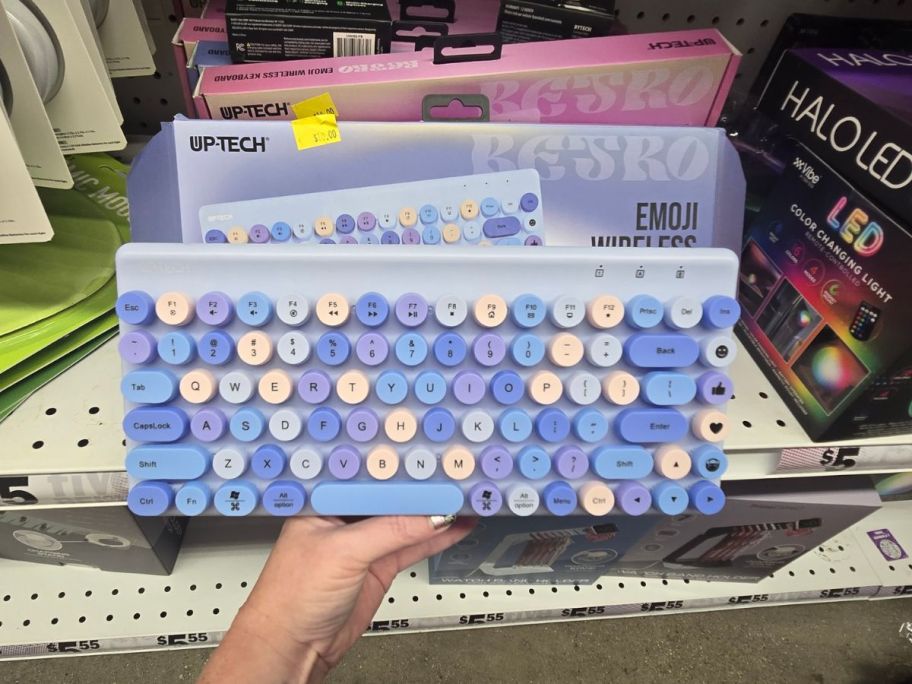 Retro Emoji Wireless Keyboard in hand in store