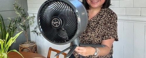 woman holding Shark FlexBreeze Cordless Fan