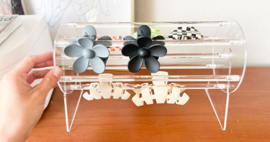 Snowstar 360-Degree Rotating Acrylic Claw Clip Organizer on dresser