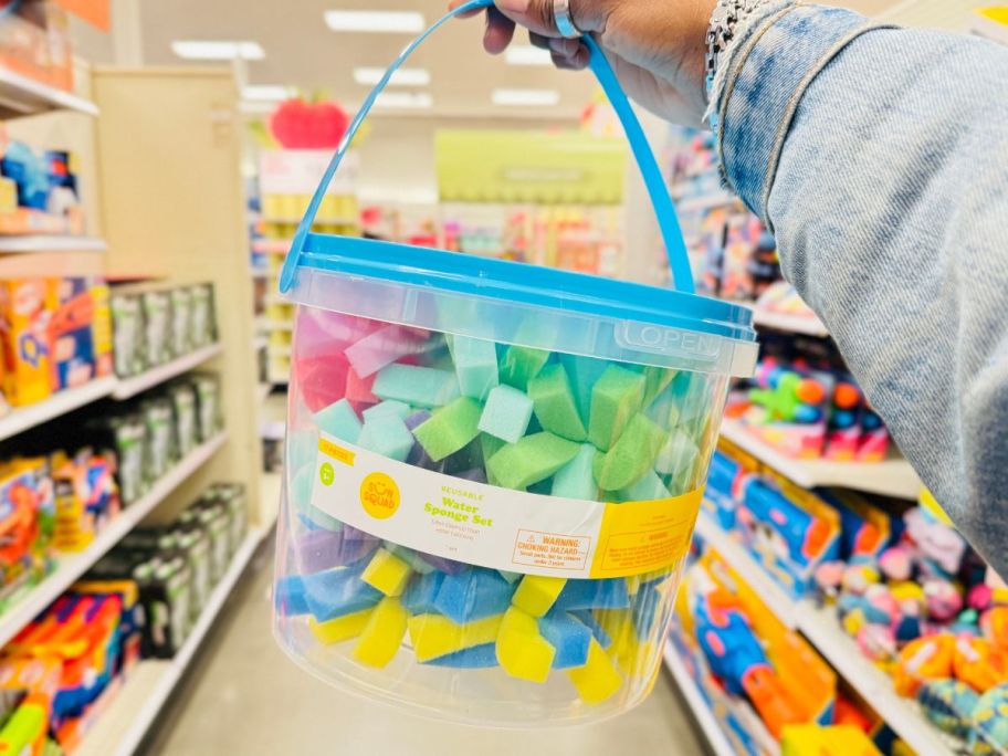 Sun Squad Reusable Sponge Balls bucket in hand in store