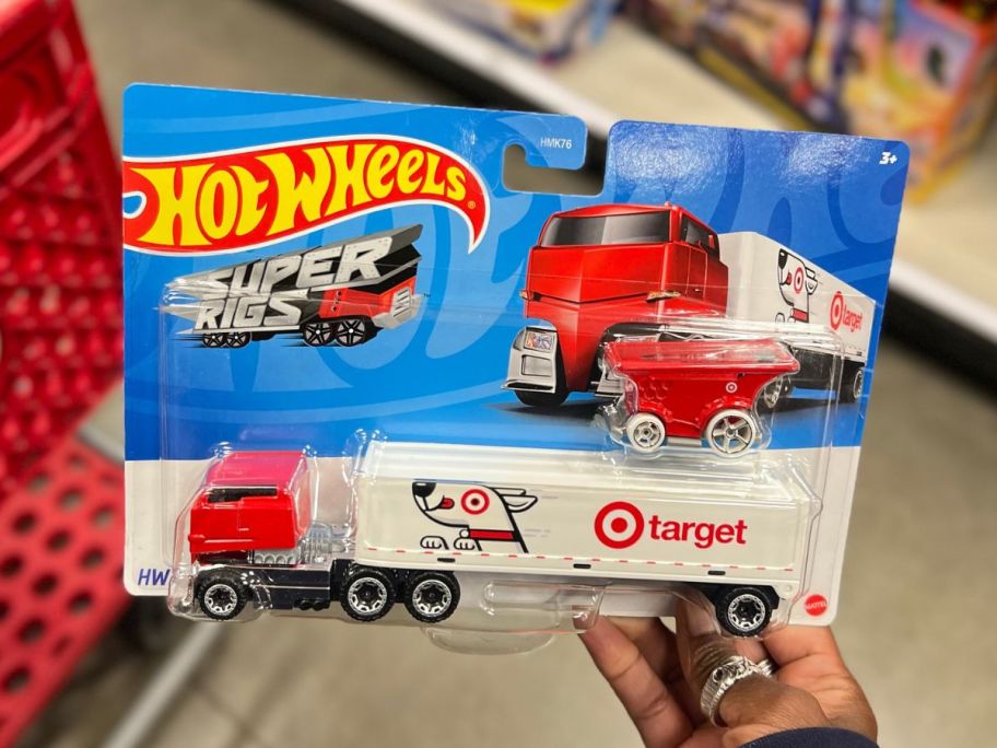hand holding a Hot Wheels Target themed Super Rig 