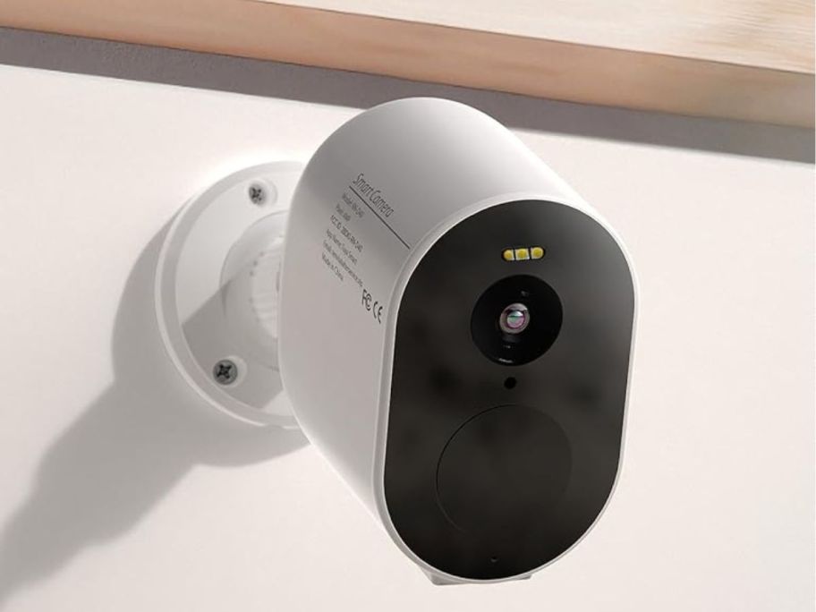 A Tenvis Security Camera mounted to a wall