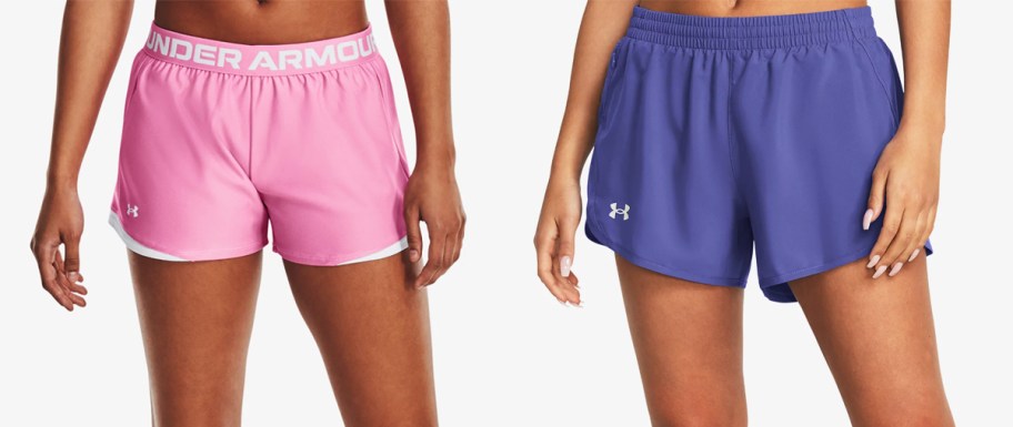 two women in pink and purple under armour shorts