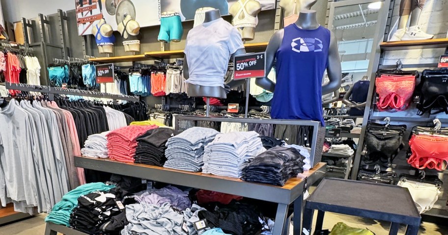 store display of under armour tops