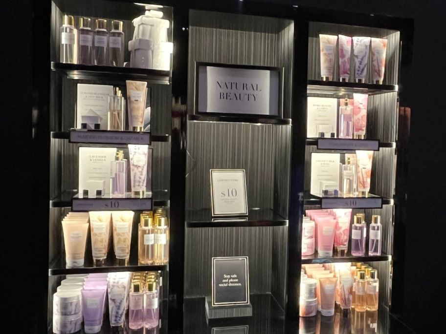 A wall of Victorias Secret Lotions and Sprays
