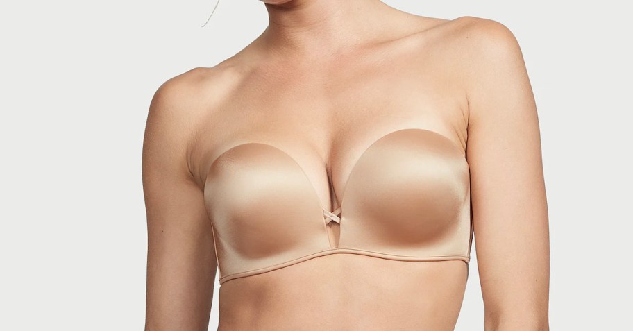 Close up photo of women wearing nude colored strapless bra