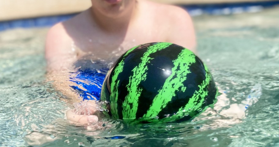 playing with a watermelon ball in pool