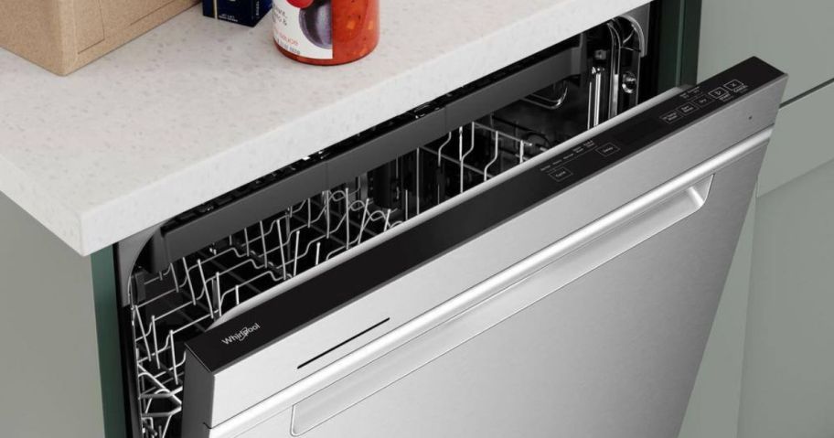 A Whirlpool Dishwasher with the door cracked open