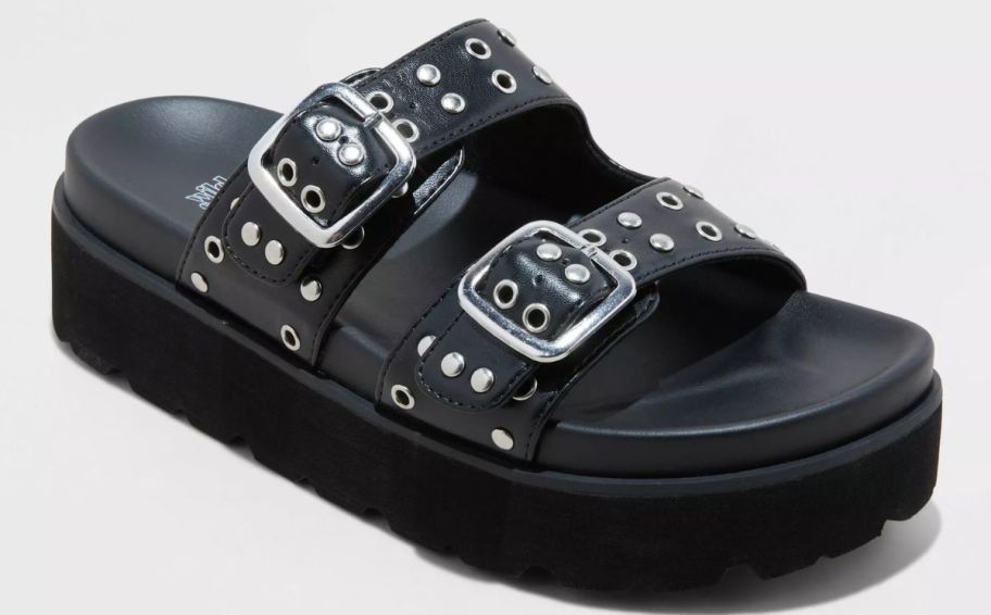 a lug sole platform in black studded leather