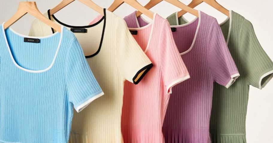 5 women's dresses on hangers 