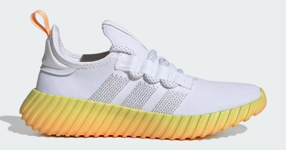 women's adidas shoe in white and yellow/orange sole