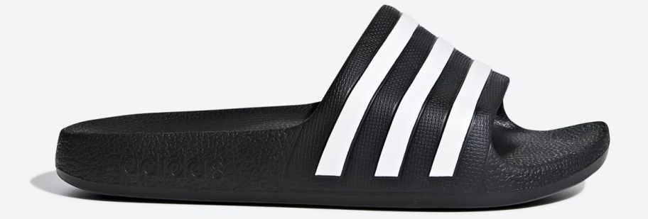 black adidas slide with white stripes