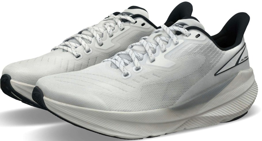 pair of white and black running shoes